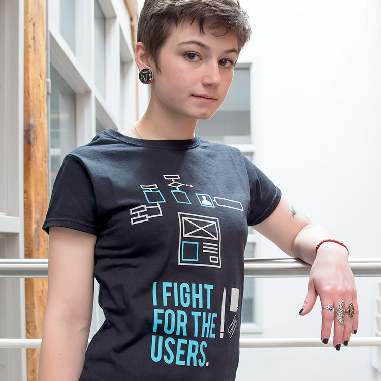 a girl modeling the I Fight for the Users tee shirt design